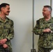 Rear Adm. James Waters, Commander, Navy Recruiting Command, right, speaks with Cmdr. Patrick Henken, commanding officer, Navy Talent Acquisition Group Ohio River Valley.