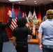 Rear Adm. James Waters, Commander, Navy Recruiting Command, administered the Oath of Enlistment to future Sailors and Marines at the Columbus Military Entrance Processing Station