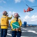 U.S. Coast Guard Cutter Stratton crew train with an U.S. Coast Guard Air Station Barbers Point MH-65 Dolphin aircrew near Hawaii