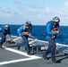U.S. Coast Guard Cutter Stratton crew train with an U.S. Coast Guard Air Station Barbers Point MH-65 Dolphin aircrew near Hawaii