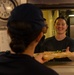 U.S. Coast Guard Cutter Stratton culinary specialists prepare lunch while transiting on the Pacific Ocean