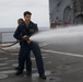 Fresh-water washdown aboard USS Harpers Ferry