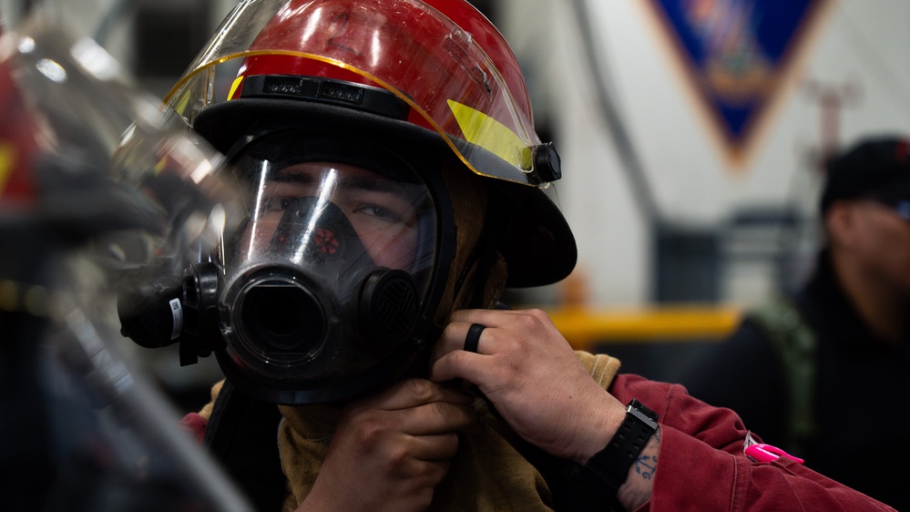 Sailors aboard USS George Washington conduct damage control drills