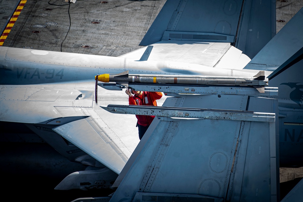 Nimitz Sailor Inspects Ordnance
