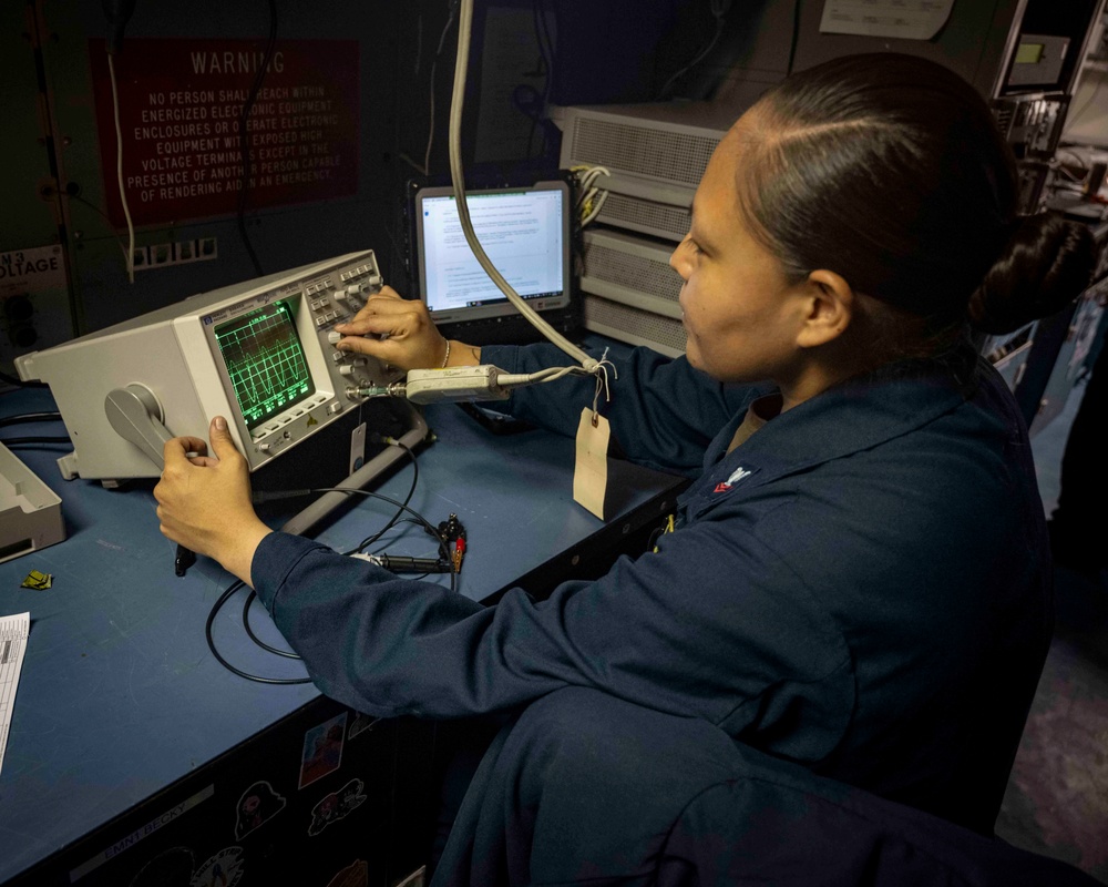 Nimitz Sailor Calibrates an Oscilloscope
