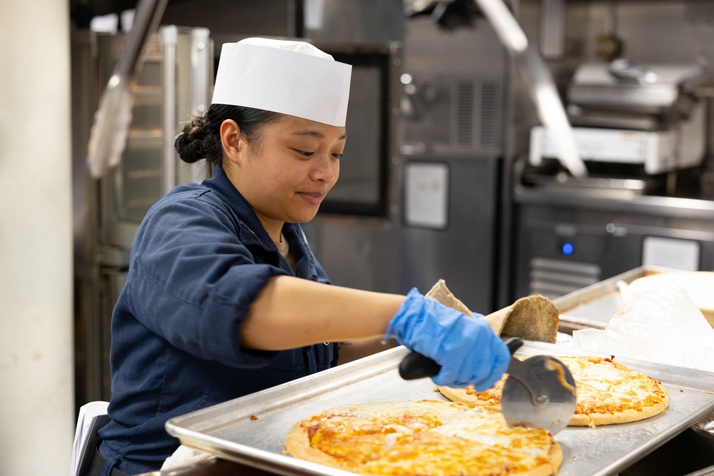 Curtis Wilbur Sailors Prepares Dinner