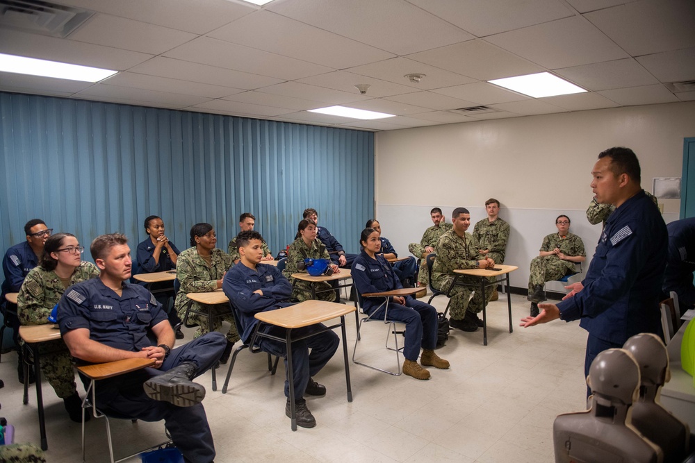 USS John C. Stennis (CVN 74) Sailors conduct CPR training