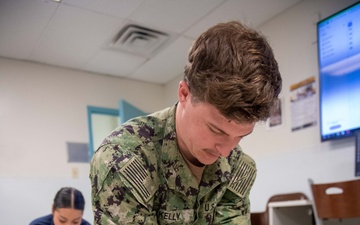 USS John C. Stennis (CVN 74) Sailors conduct CPR training