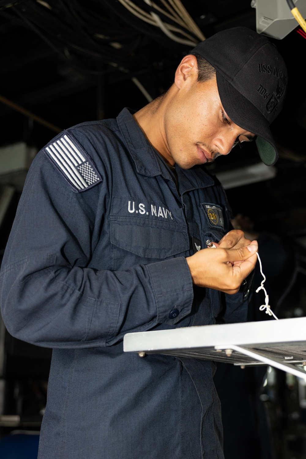 Curtis Wilbur Sailor Conducts Fancywork