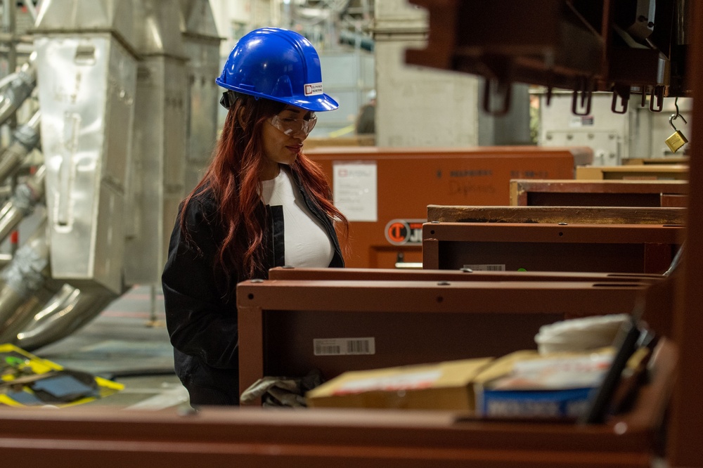 USS Ronald Reagan (CVN 76) Sailors and Puget Sound Naval Shipyard contractors conduct routine operations and ship maintenance