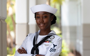 NTAG Miami Sailor Poses for a Photo