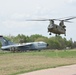 CH-47 Chinook transfers A-7 corsair static display off Martin Field