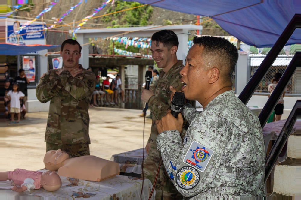 U.S., Philippines forces, provide aid to Barangay Dugui San Isidro, Virac, locals.