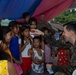 U.S., Philippines forces, provide aid to Barangay Dugui San Isidro, Virac, locals.
