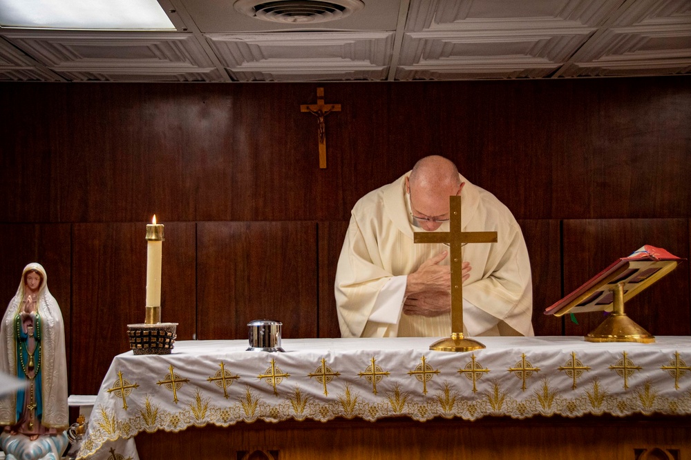 Nimitz Sailors Participate in a Catholic Service