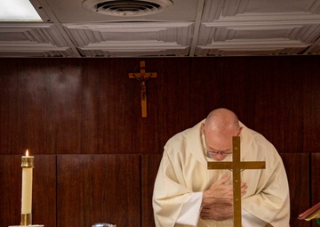 Nimitz Sailors Participate in a Catholic Service