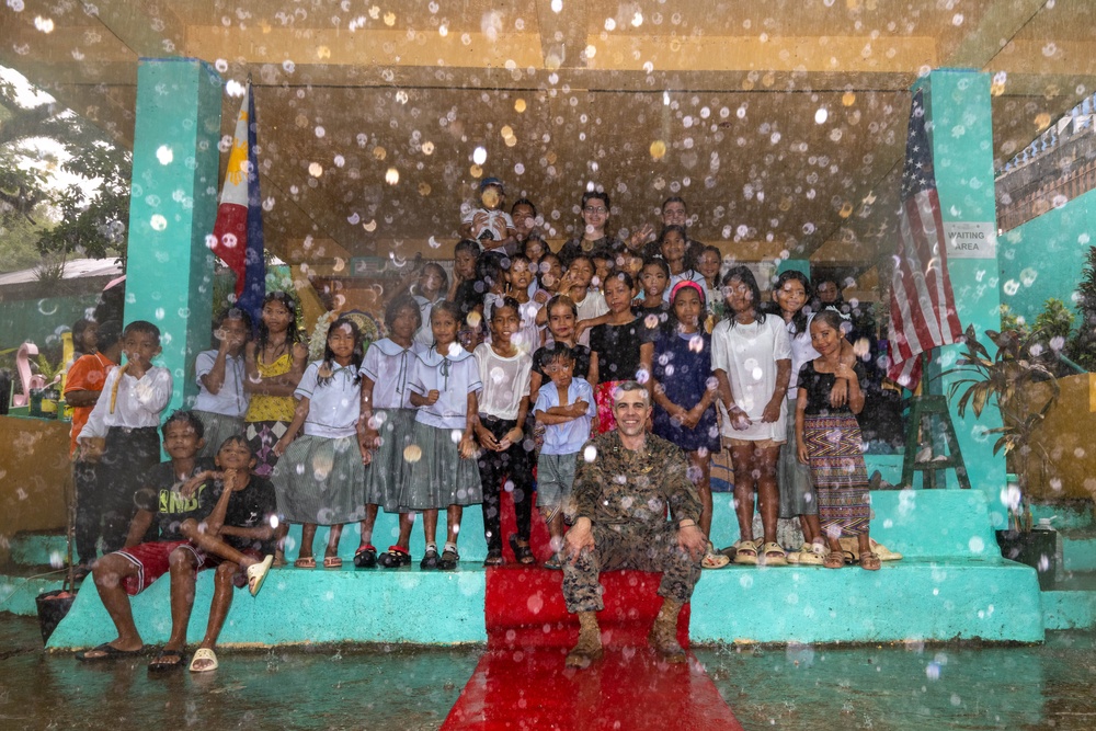 U.S., Philippines forces, ‘Bundle of Joy’ reaches Dugui San Isidro Elementary School.