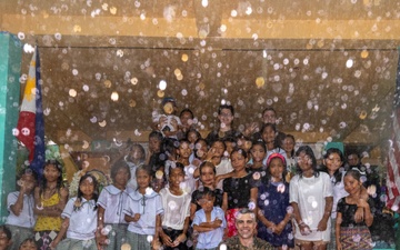 U.S., Philippines forces, ‘Bundle of Joy’ reaches Dugui San Isidro Elementary School.