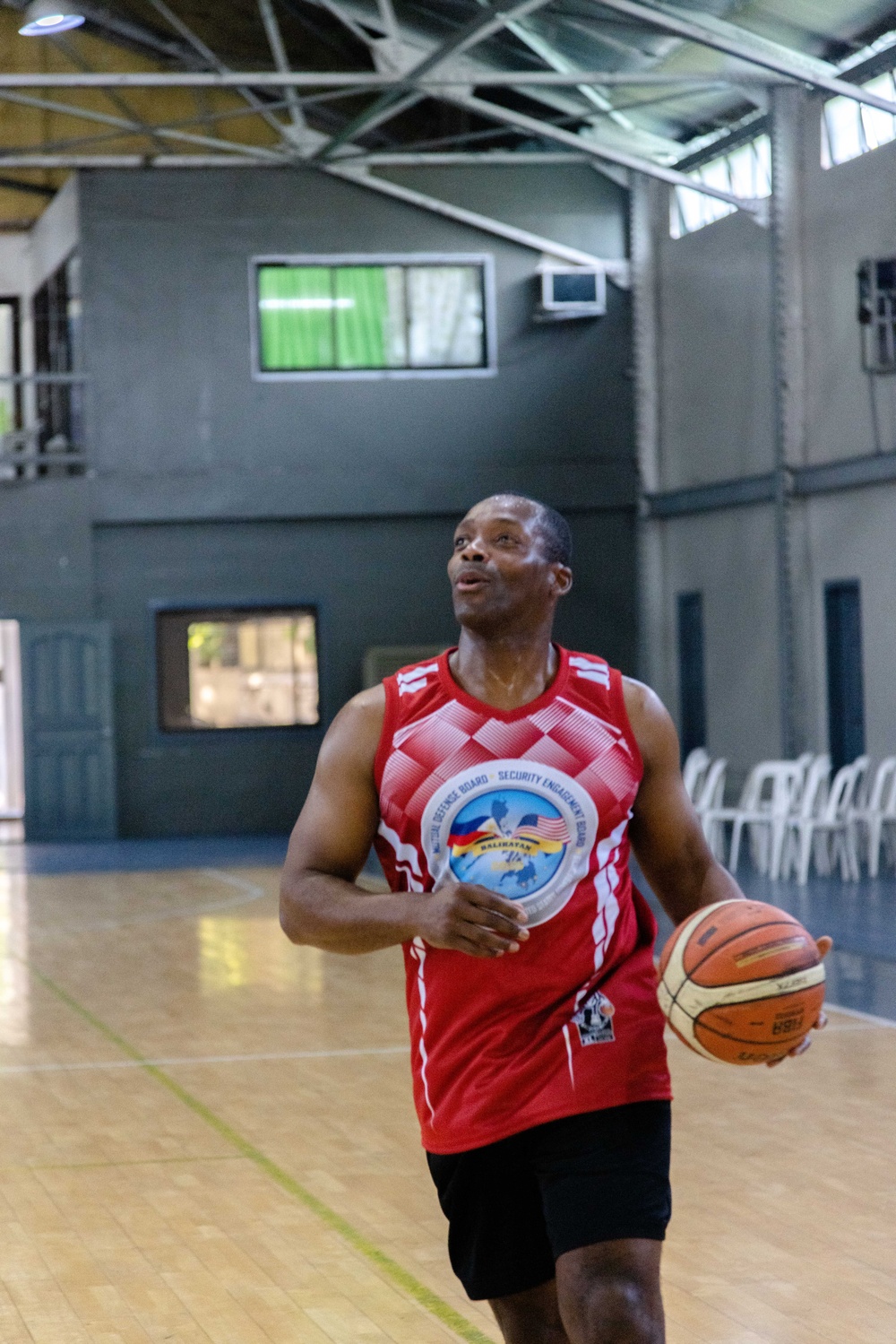 U.S. and Filipino service members play basketball during US-PH friendship games