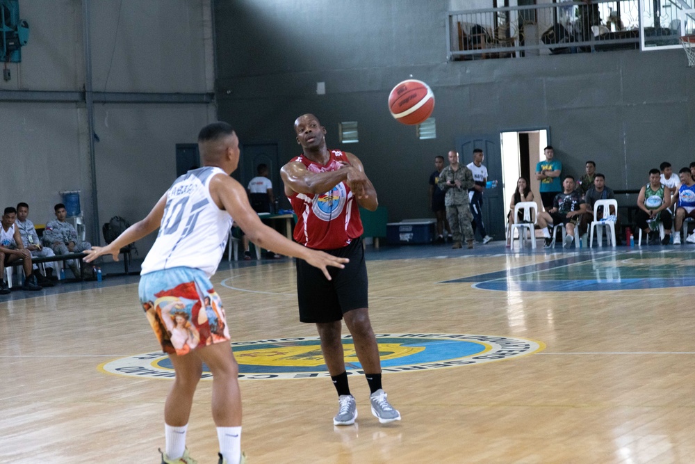 U.S. and Filipino service members play basketball during US-PH friendship games