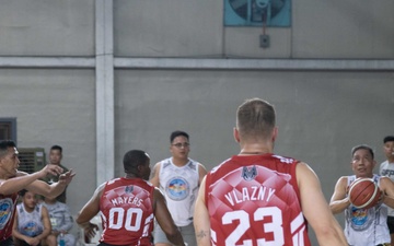 U.S. and Filipino service members play basketball during US-PH friendship games