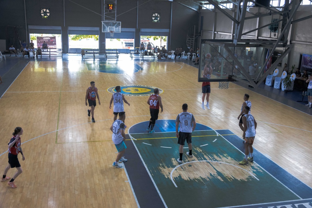 U.S. and Filipino service members play basketball during US-PH friendship games
