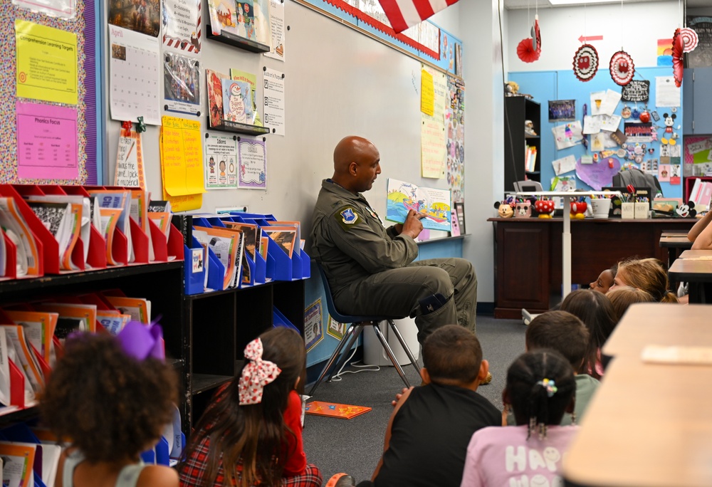 Crow 01 reads to Eglin Elementary