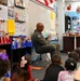 Crow 01 reads to Eglin Elementary