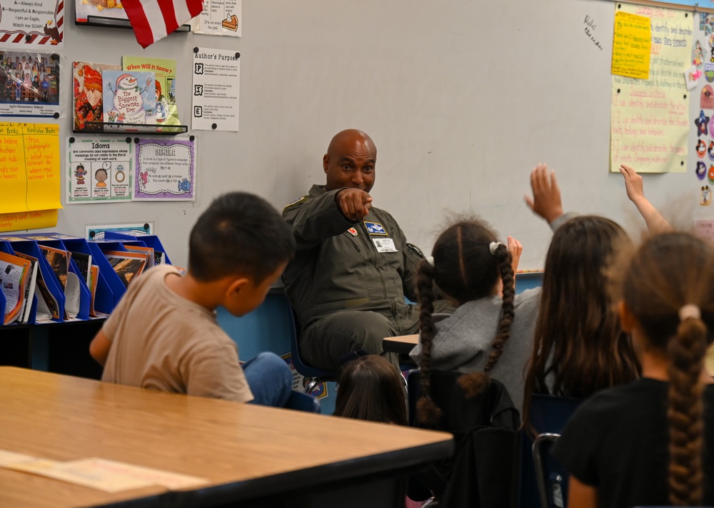 Crow 01 reads to Eglin Elementary