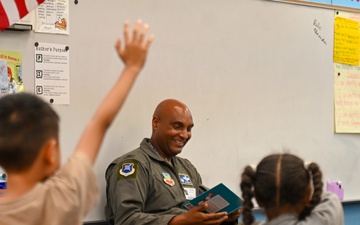 Crow 01 reads to Eglin Elementary