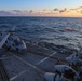 Boatswain Mate 2nd Class Jalynn Simons clears the launch of a MH-60R Sea Hawk helicopter Formidable Shield (FS) 2025