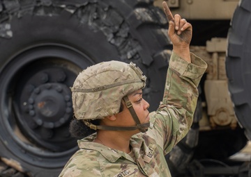 13th Armored Corps Sustainment Command Soldiers offload display truck