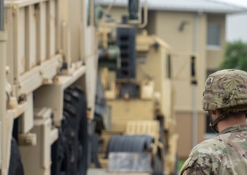 13th Armored Corps Sustainment Command Soldiers offload display truck