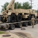 13th Armored Corps Sustainment Command Soldiers offload display truck