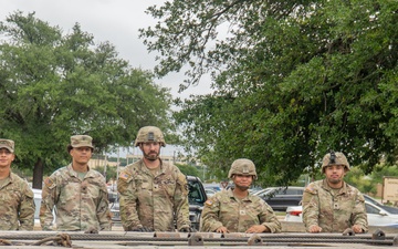 13th Armored Corps Sustainment Command Soldiers offload display truck