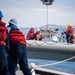 USS John P Murtha transfers personnel via a rigid hull inflatable boat