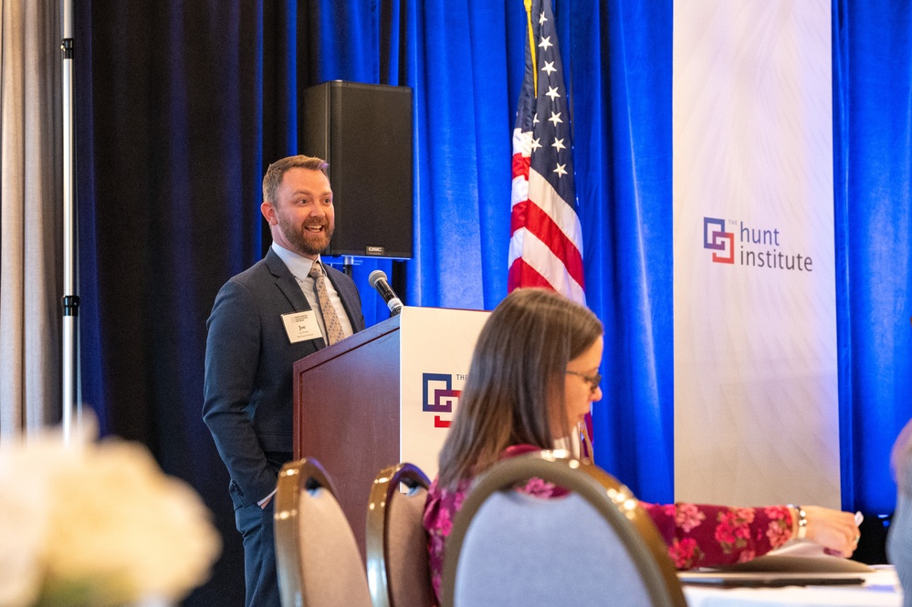 Joe Bolduc, managing director at the Hunt Institute, introduces U.S. Air Force Col. David Wyrick