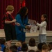 Mendel Elementary Alumni open 25-year-old time capsule