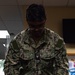 USS John C. Stennis Sailor racks pool balls