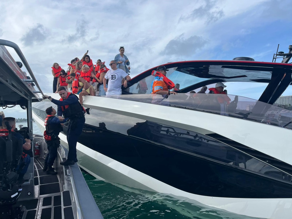 U.S. Coast Guard crew rescues 32 people from vessel taking on water