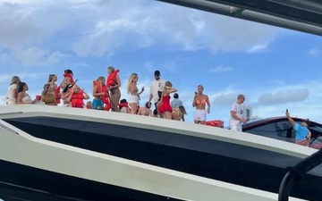 U.S. Coast Guard crew rescues 32 people from vessel taking on water