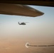 Air Force Jolly Green IIs refuel over USCENTCOM AOR