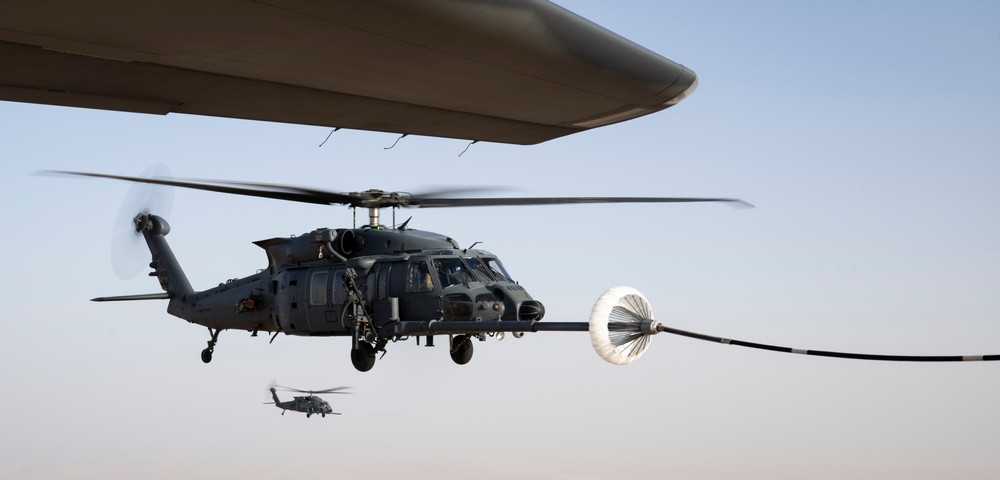 Air Force Jolly Green IIs refuel over USCENTCOM AOR
