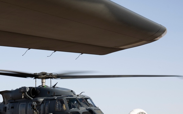 Air Force Jolly Green IIs refuel over USCENTCOM AOR
