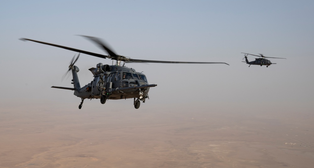 Air Force Jolly Green IIs refuel over USCENTCOM AOR