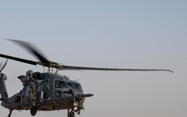 Air Force Jolly Green IIs refuel over USCENTCOM AOR