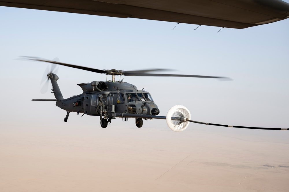 Air Force Jolly Green IIs refuel over USCENTCOM AOR