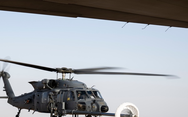 Air Force Jolly Green IIs refuel over USCENTCOM AOR