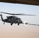 Air Force Jolly Green IIs refuel over USCENTCOM AOR