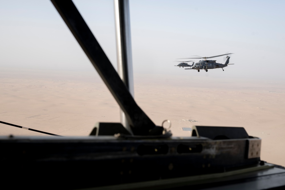 Air Force Jolly Green IIs refuel over USCENTCOM AOR